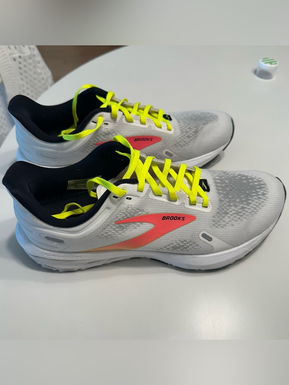 Brooks Launch 6 White Running Shoes with Neon Yellow Laces and Pink Accents